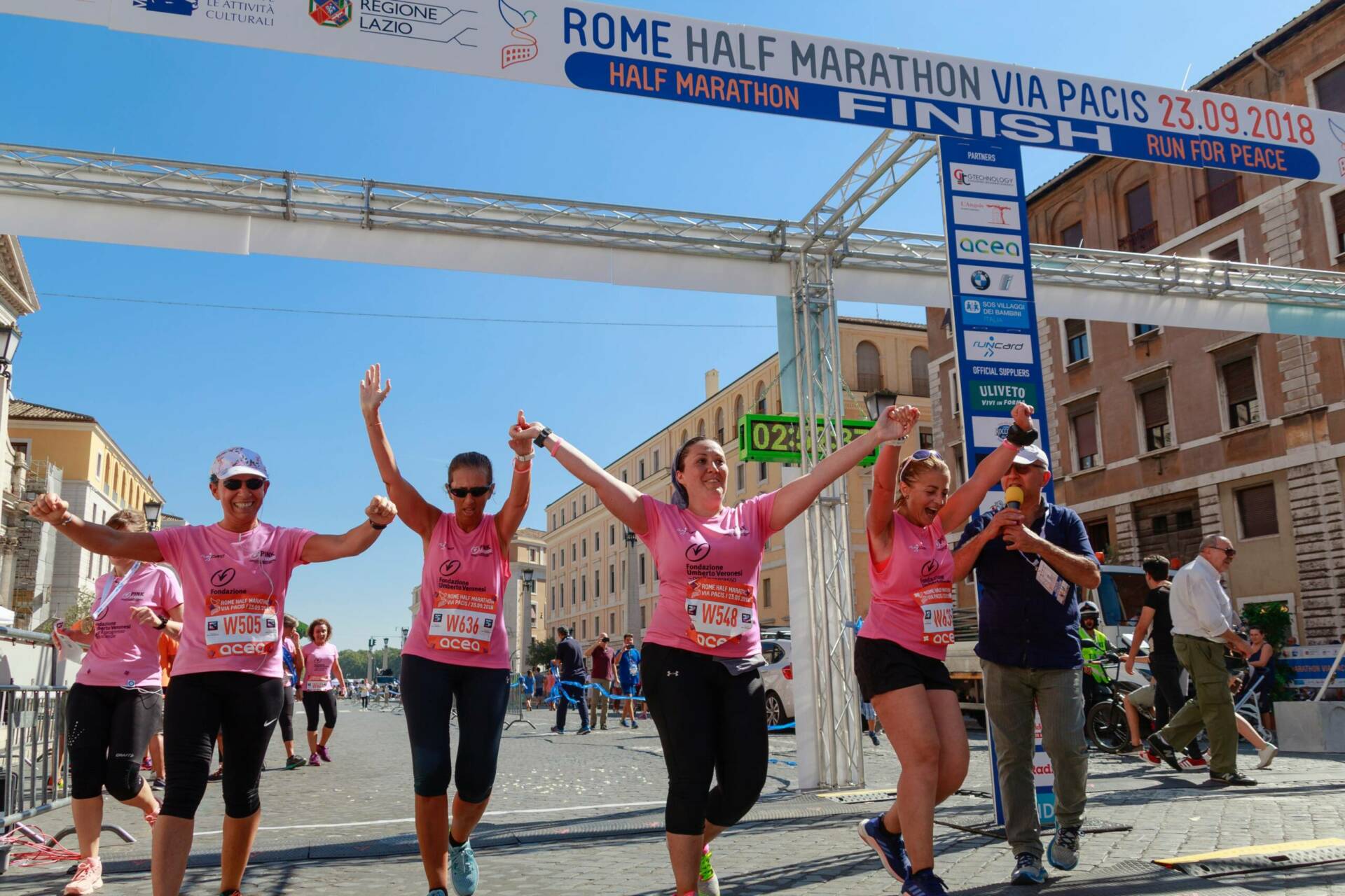 “International Women’s Day” These womens from the Pink is Good Roman Team are cheering for two reasons: the first, they just finished their first half-marathon; second, they won against a f***ing bastard, who wanted to stop their lives. But their strength was stronger and their courage without limits